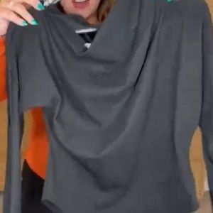 Black:NWT Hyfve off shoulder sweater top.  Has keyhole for thumb. Dolman style.